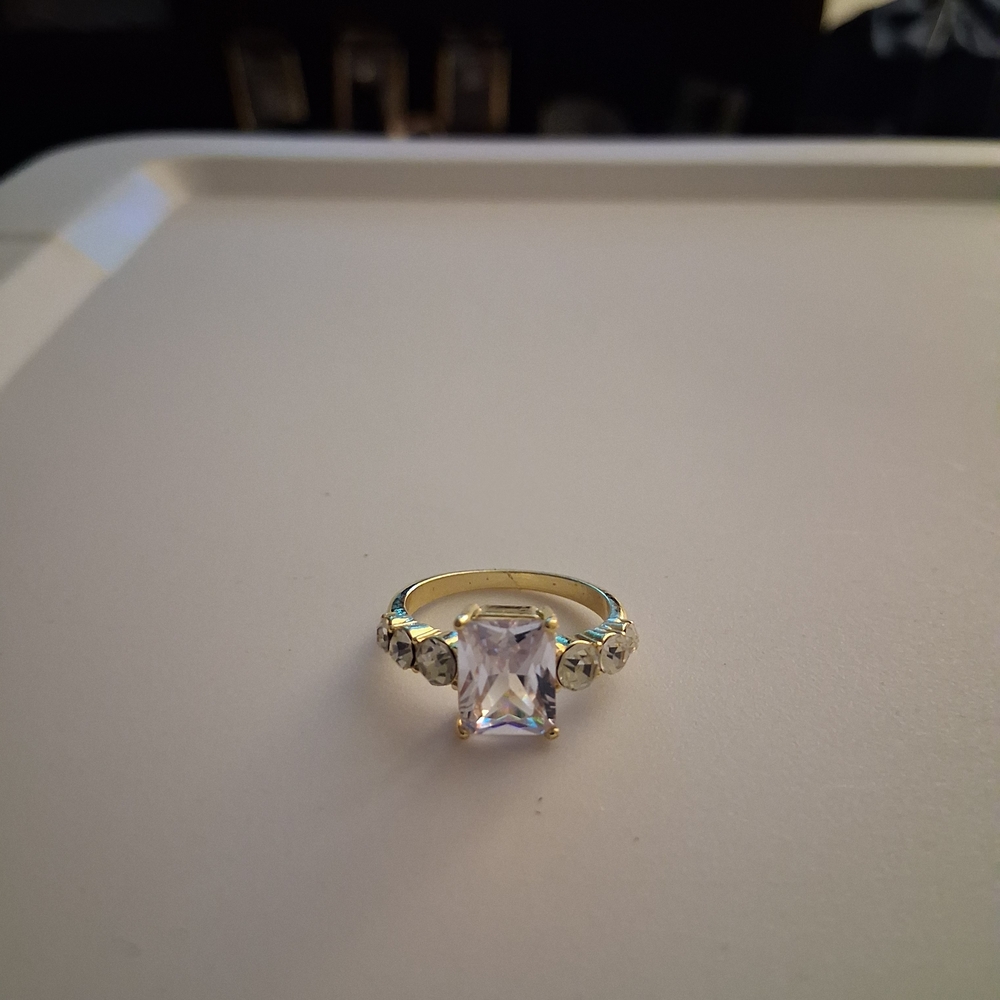 Elegant Gold Tone Ring with Clear Gemstone